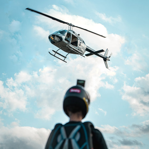 skydiver waiting for helicopter