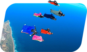 Group of skydivers flying wingsuits