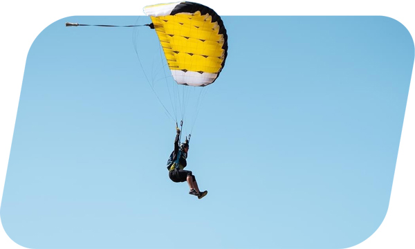 licensed skydiver flying parachute over airlie beach