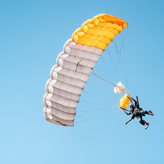 Skydiving instructor and passenger flying a parachute in Australia