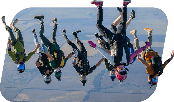 Licensed skydivers in a freefall formation