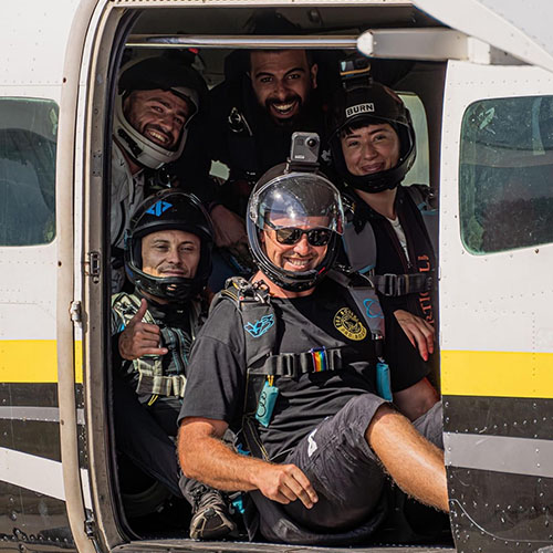 Licensed skydivers boarding a plane in Australia