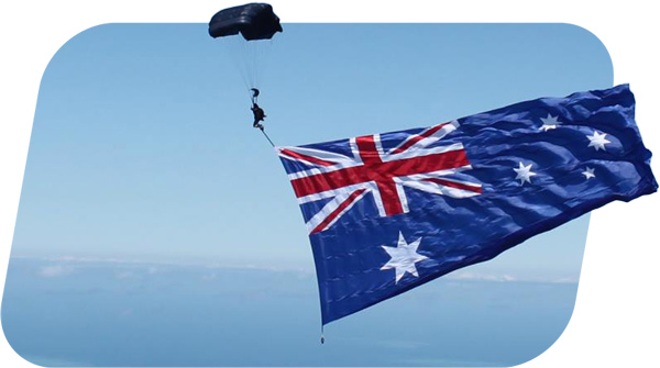 skydiver flying an Australian flag