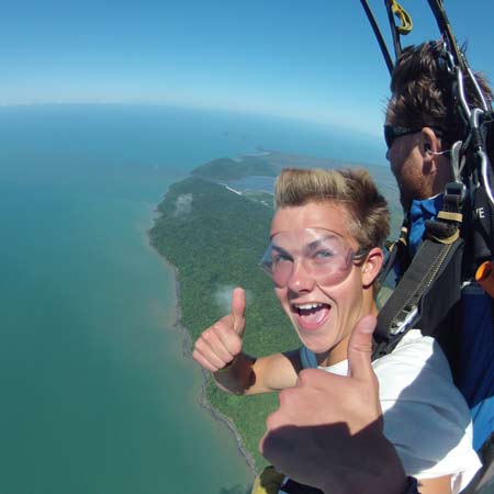 skydiving customer giving thumbs up to camera