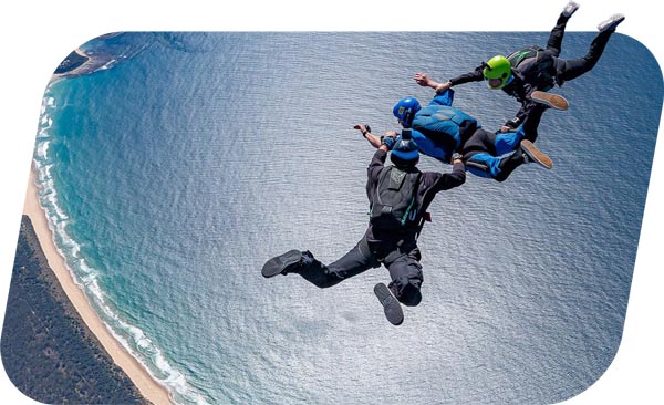 AFF skydiving student in freefall with instructors