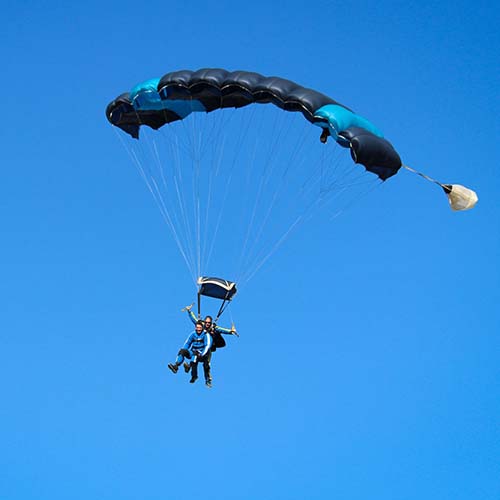 customer under parachute skydiving in Sydney