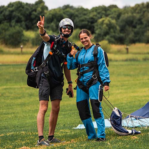 customer and skydiving instructor posing for a photo in Sydney