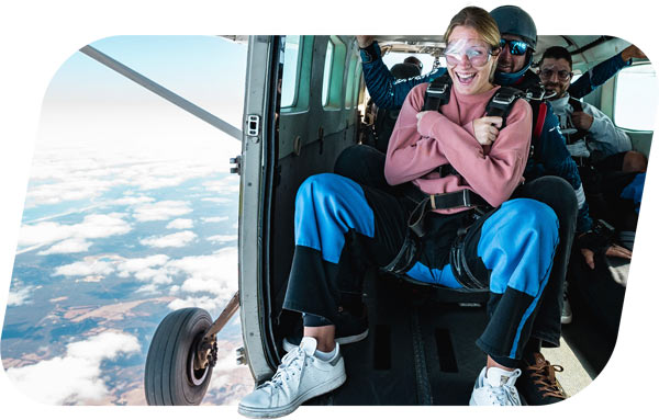customer skydiving in Melbourne over the Great Ocean Road in the plane about to go in freefall