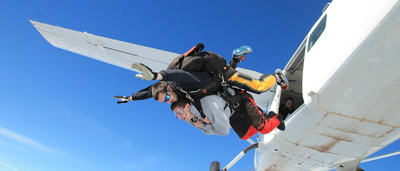 Tandem skydiving instructor and customer exiting plane in Torquay Melbourne